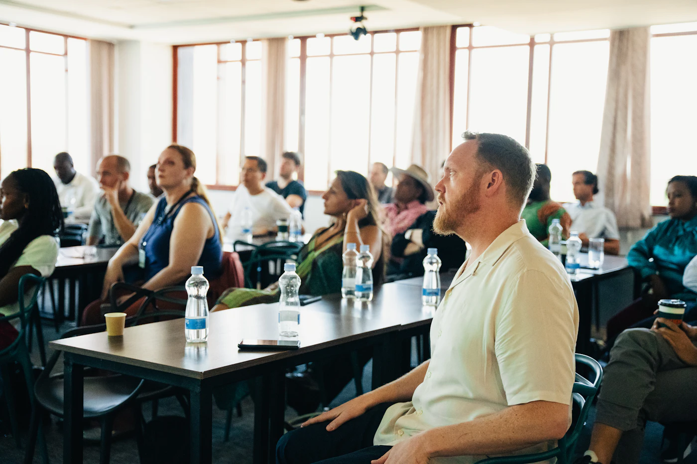 Deelnemers tijdens een workshop of training